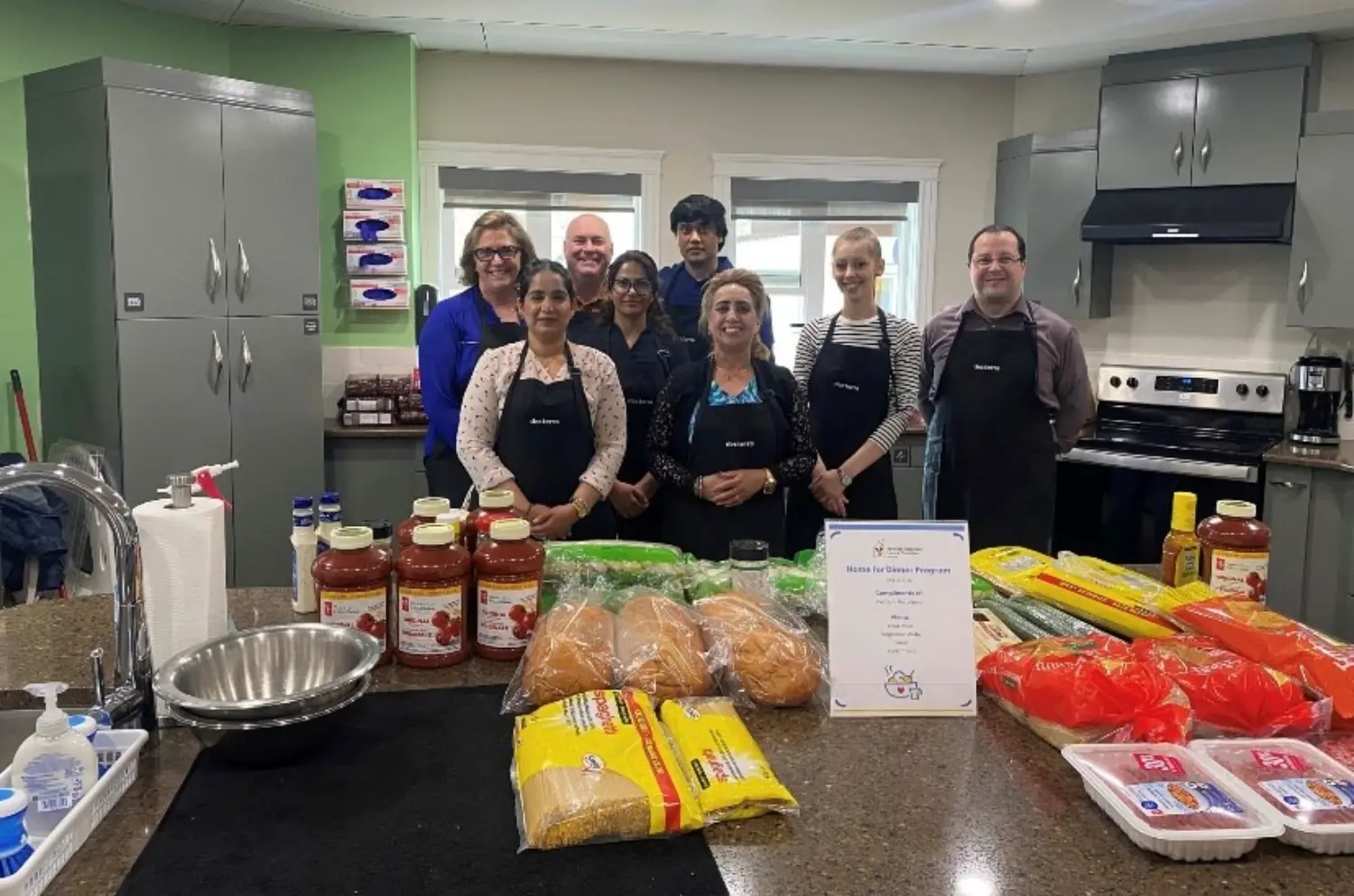 Dexterra employees volunteering at Ronald McDonald House, supporting families and strengthening community connections.