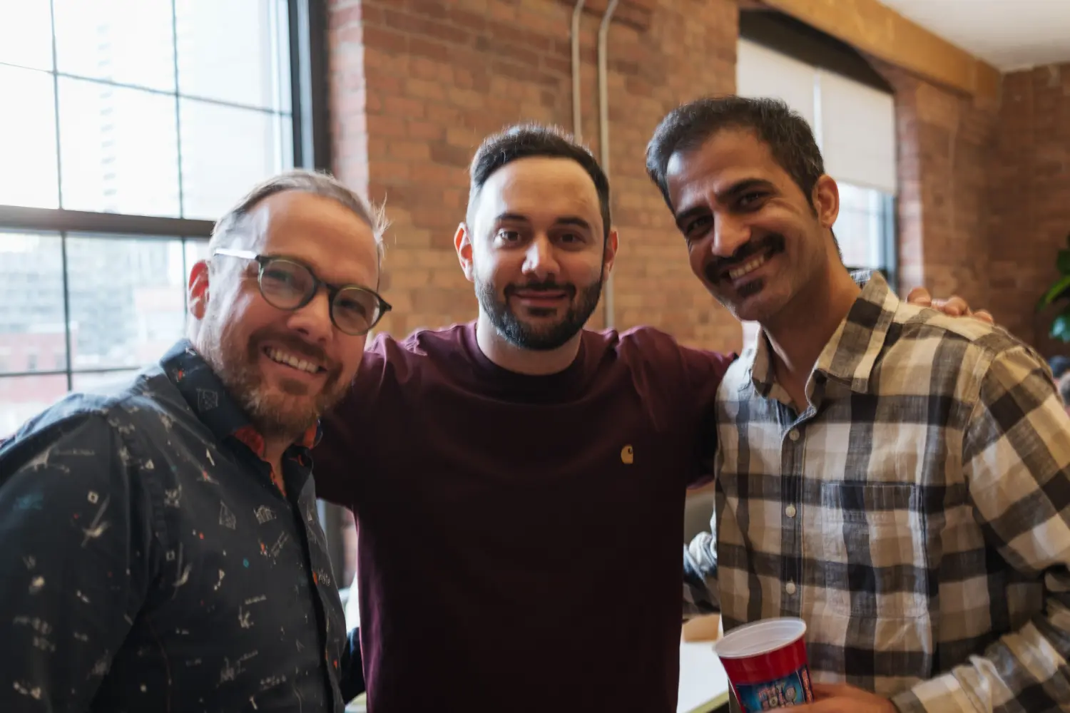 Colleagues from different departments connecting and building relationships.