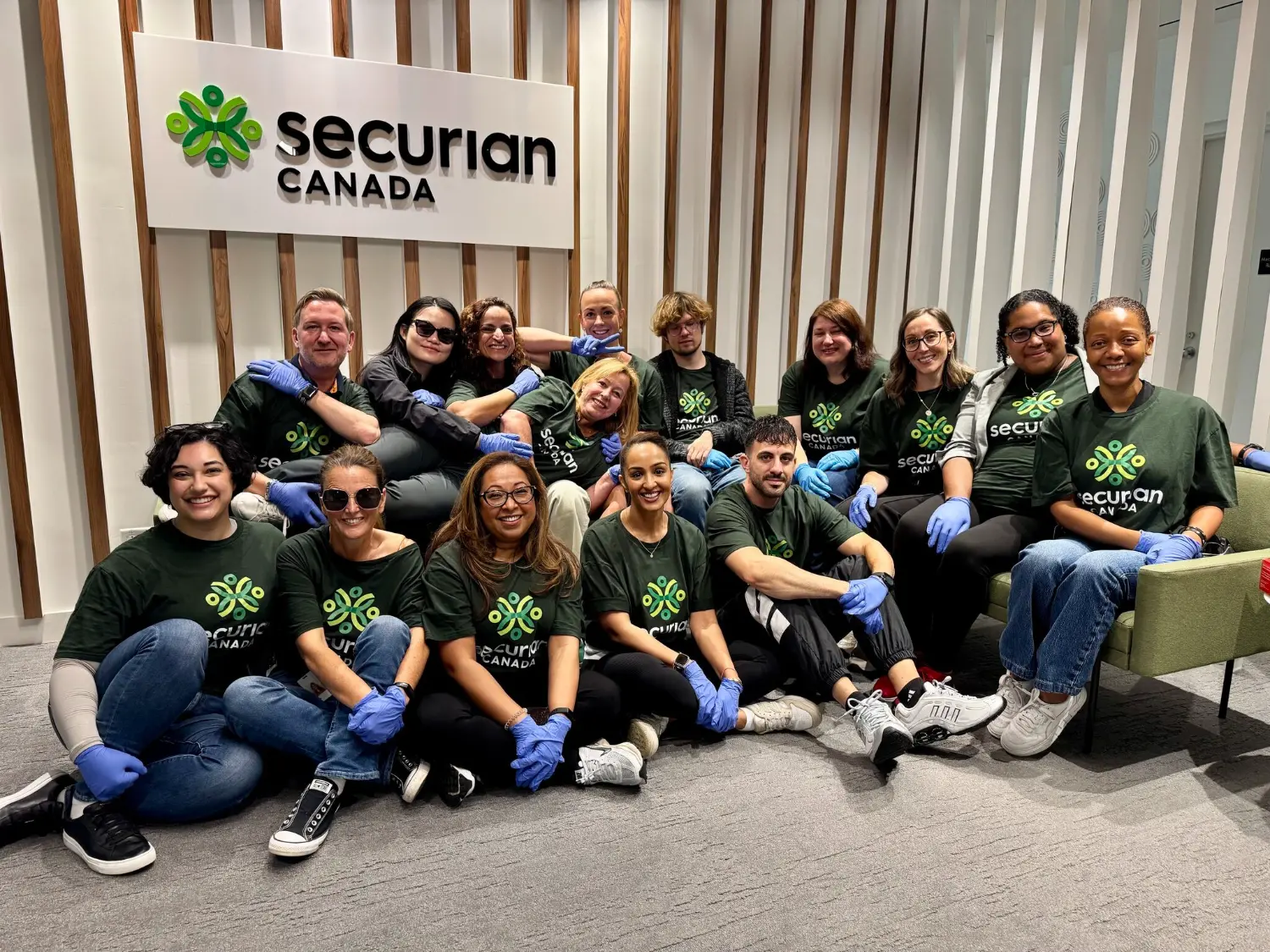 Securian Canada employees prepare to head out for a volunteer clean-up at a local park.