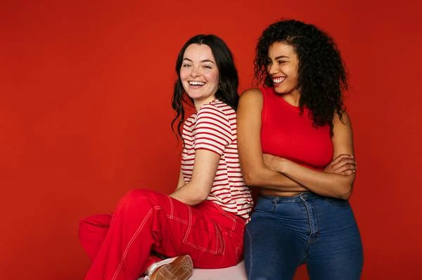 Two colleagues laughing together