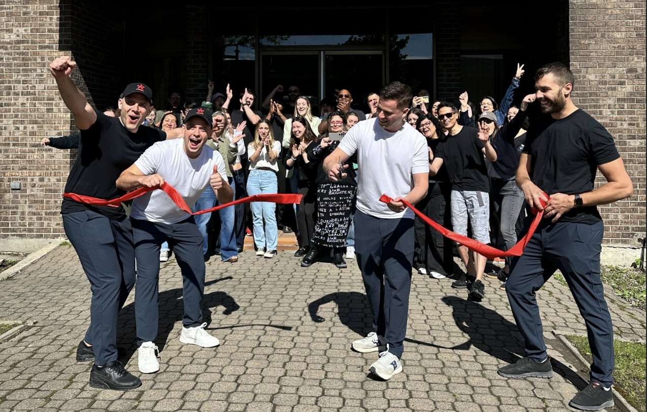 The ribbon cutting ceremony of our new office. The team was super happy to move in a bigger and more functional space.