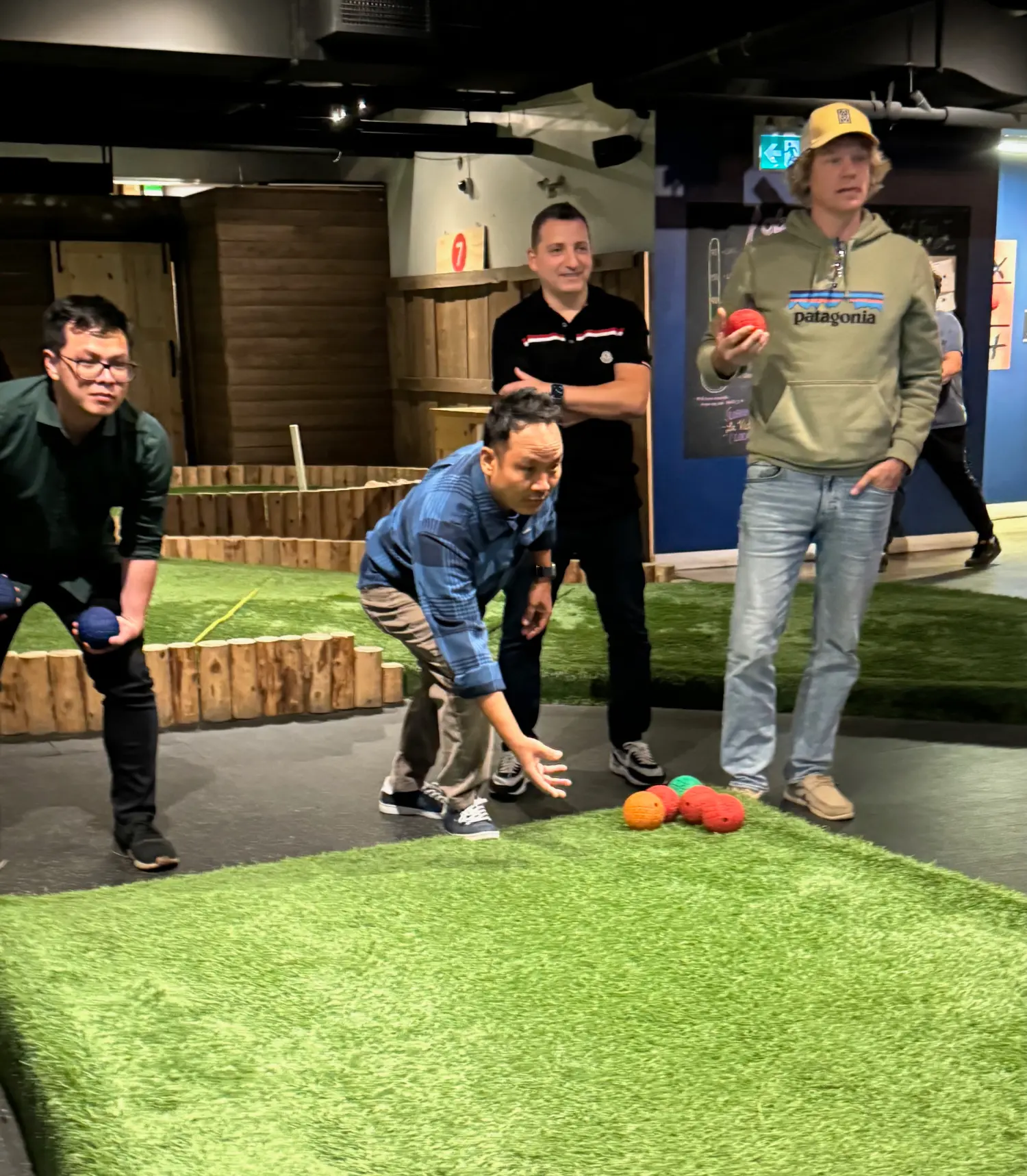 Bocce ball action during a fun-filled day of games, food and drinks to celebrate together.
