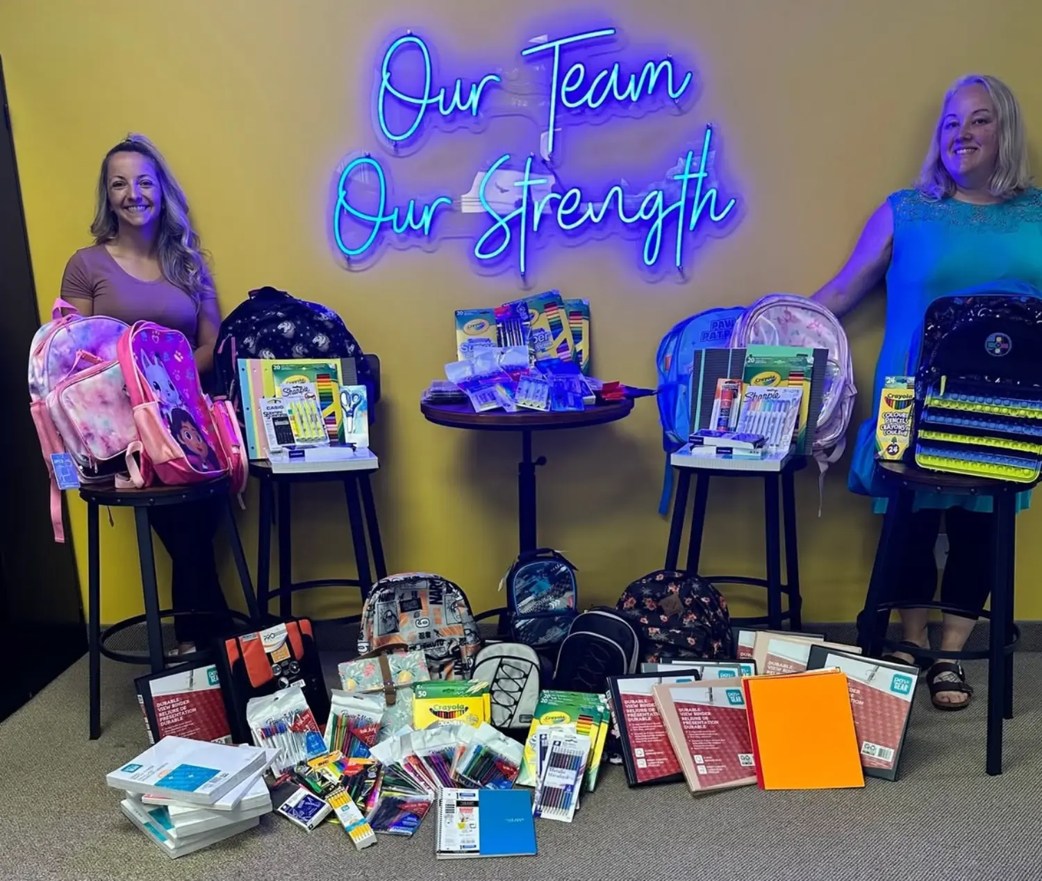 Back to school backpack drive where our staff all chip in to help kids and families in need.
