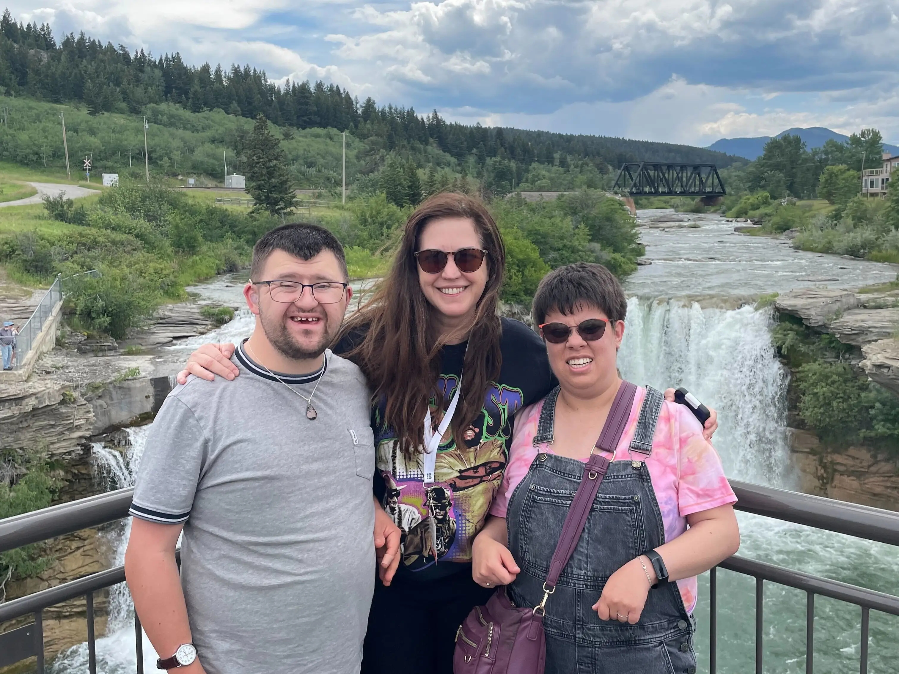 Adults on a trip to see a waterfall through the Adventurers Program