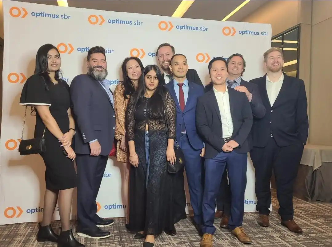 Team celebrating a client formal event