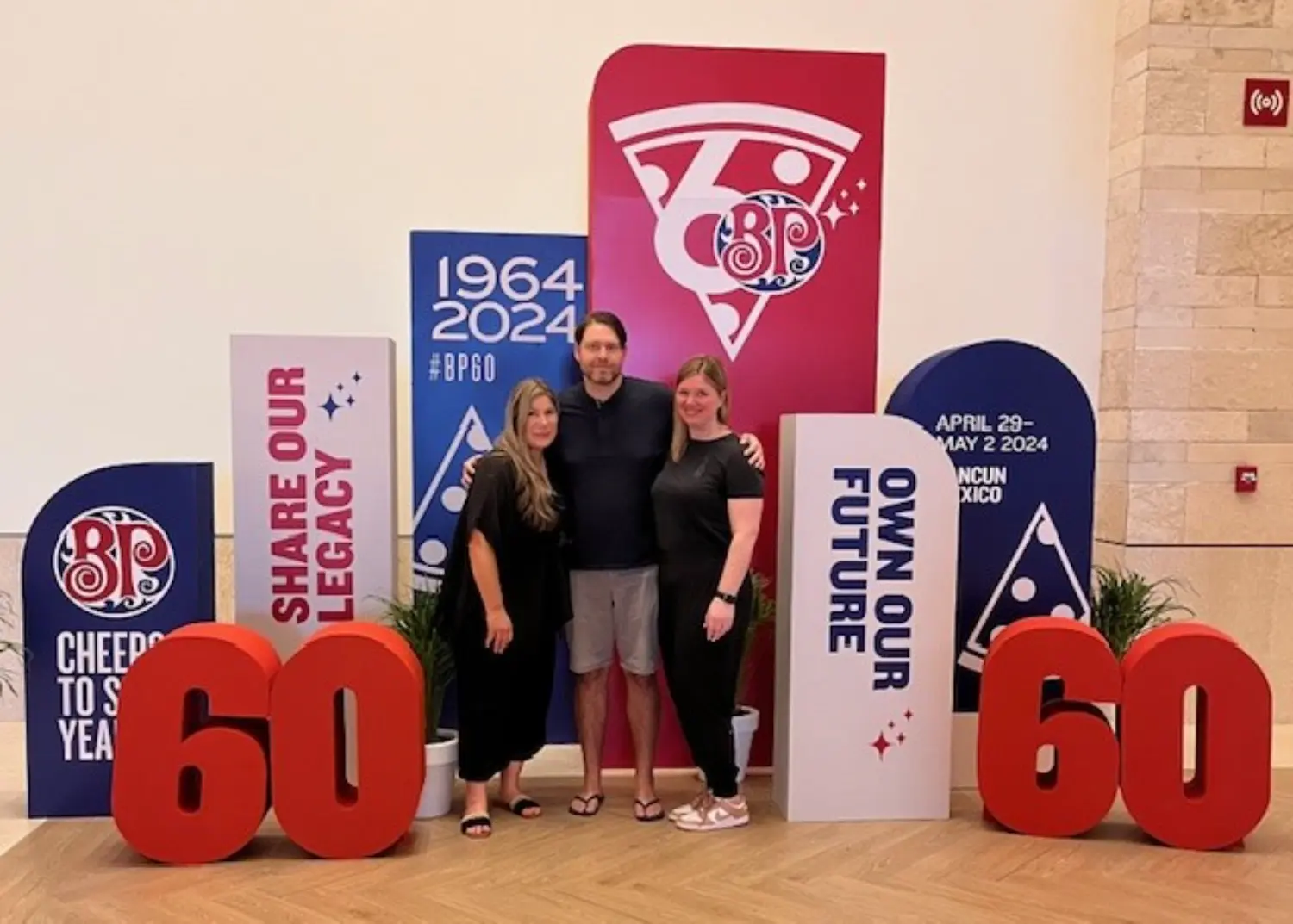 Our Senior Leadership celebrating 60 years of Boston Pizza — proudly Canadian, and proudly locally owned and operated!