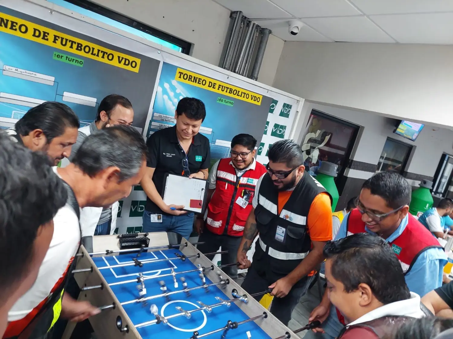 Mexico team members take a break with an organized Futbolito tournament in celebration of Father's Day.