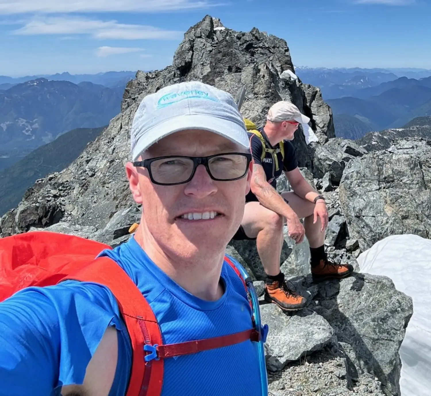 A Waverley rep on top of one of the highest peaks in BC.