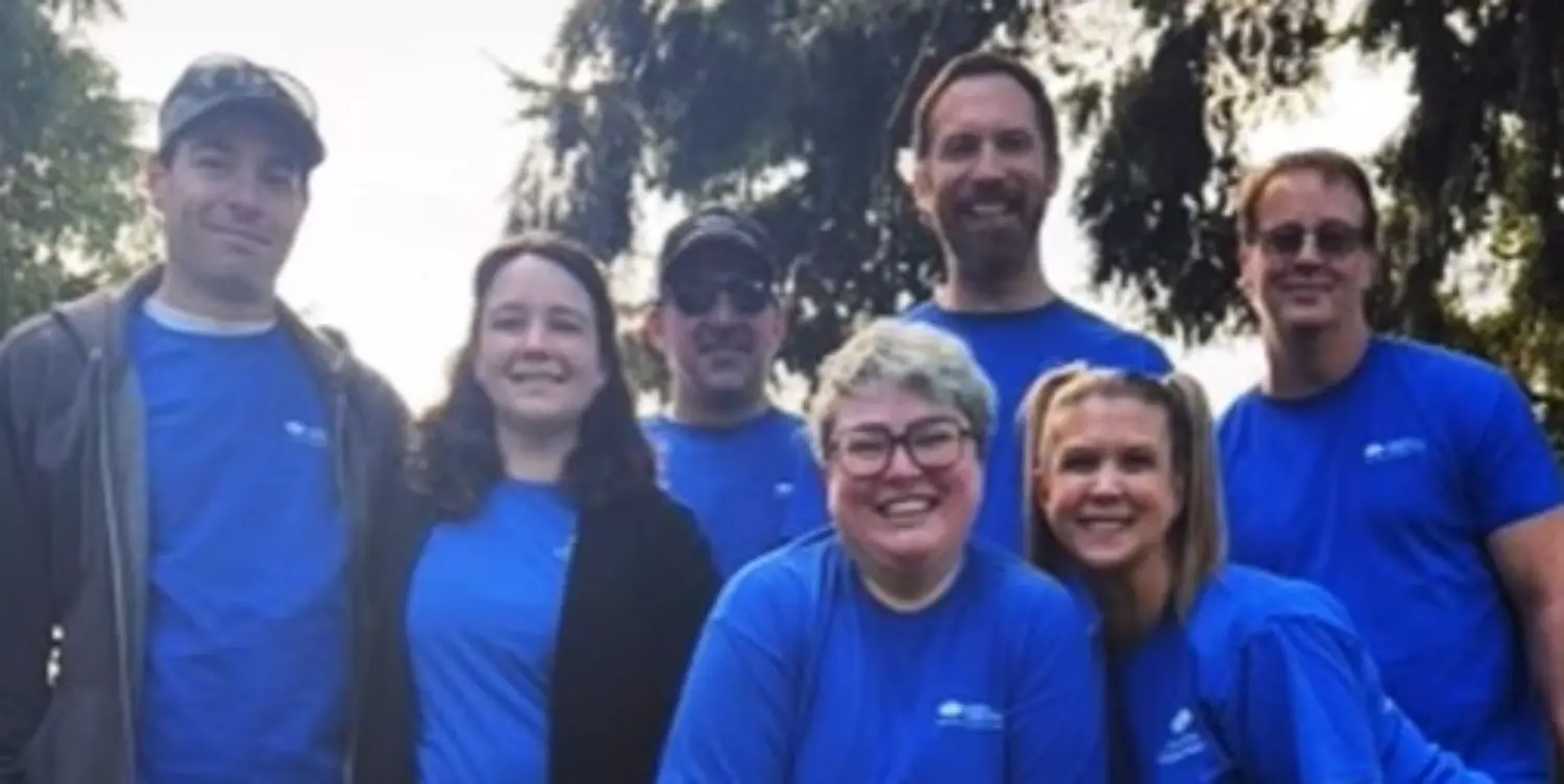 Employees volunteering at an event in support of a local childrens centre