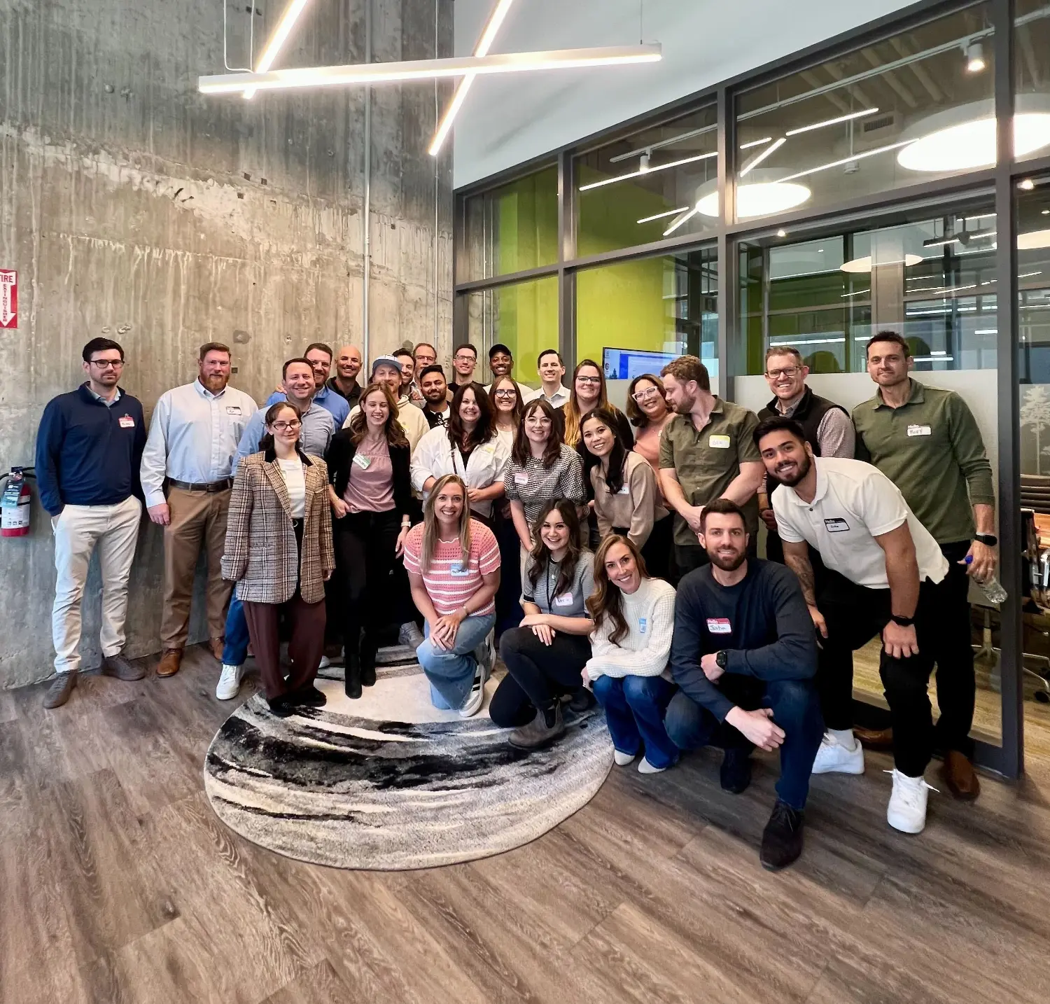 Welcoming new teammates at our quarterly new employee event called CampGreen!