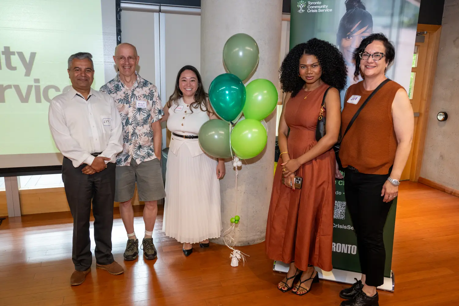 Team members and our Executive Director celebrate the city wide Toronto Community Crisis service expansion anniversary
