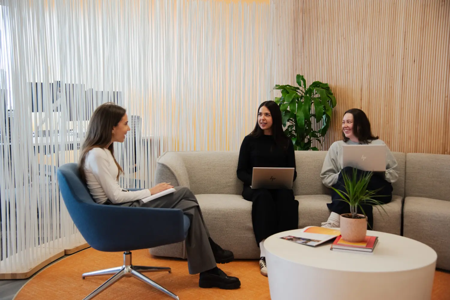 Breakout spaces make it easy to connect. Here, members of our global sustainability network meet to share ideas.