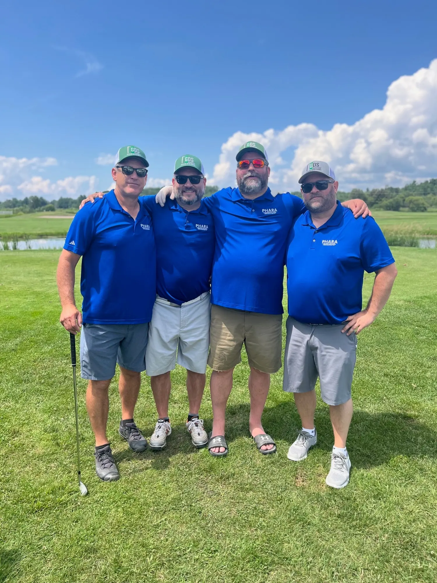 Several members of the Board of Directors support a local golf tournament.