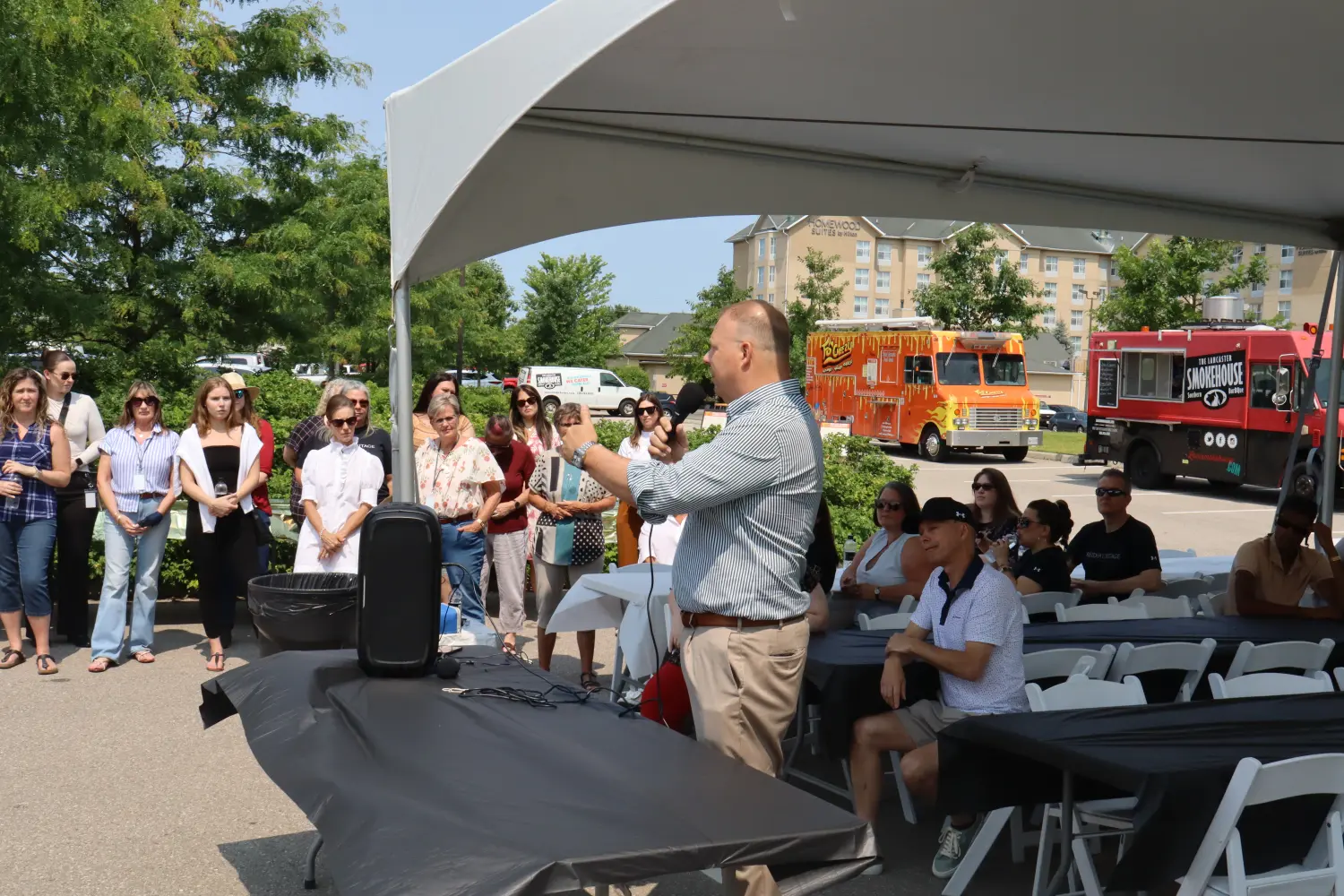 Our CEO addressing the team at this year’s annual BBQ — a moment to reflect, reconnect, and look ahead together.