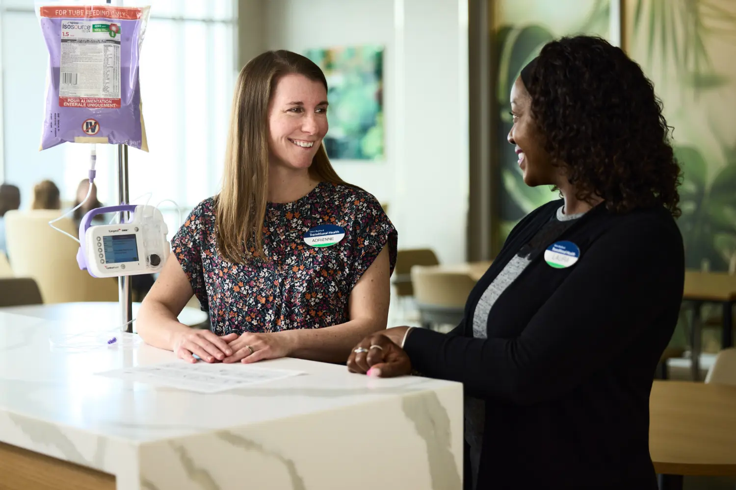 Team members from West Bedford Transitional Health in Bedford, Nova Scotia discuss a patients personalized care plan