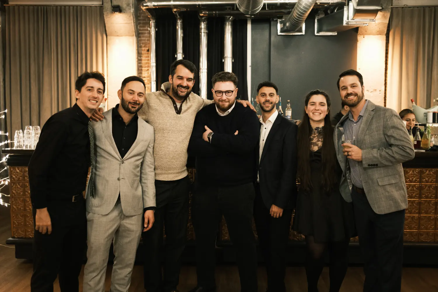 Celebrating wins growth and partnerships the CM Labs sales team raised a glass to another successful year