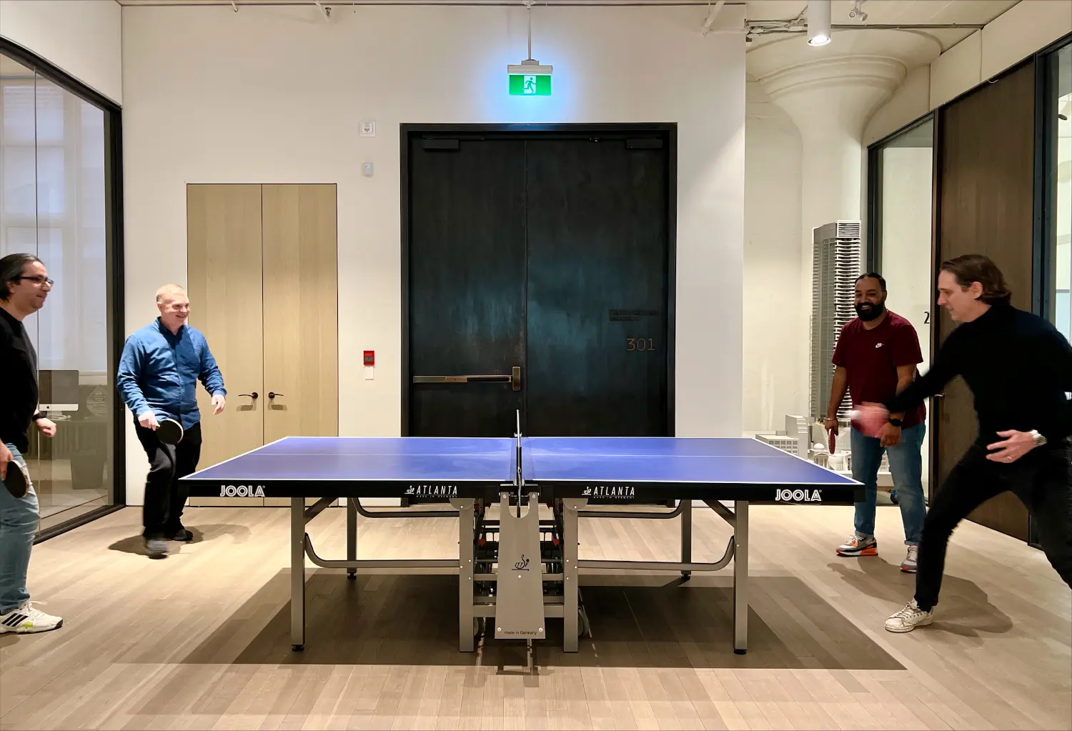 HPA employees regularly participate in friendly sports competition in-office, such as ping pong tournaments.