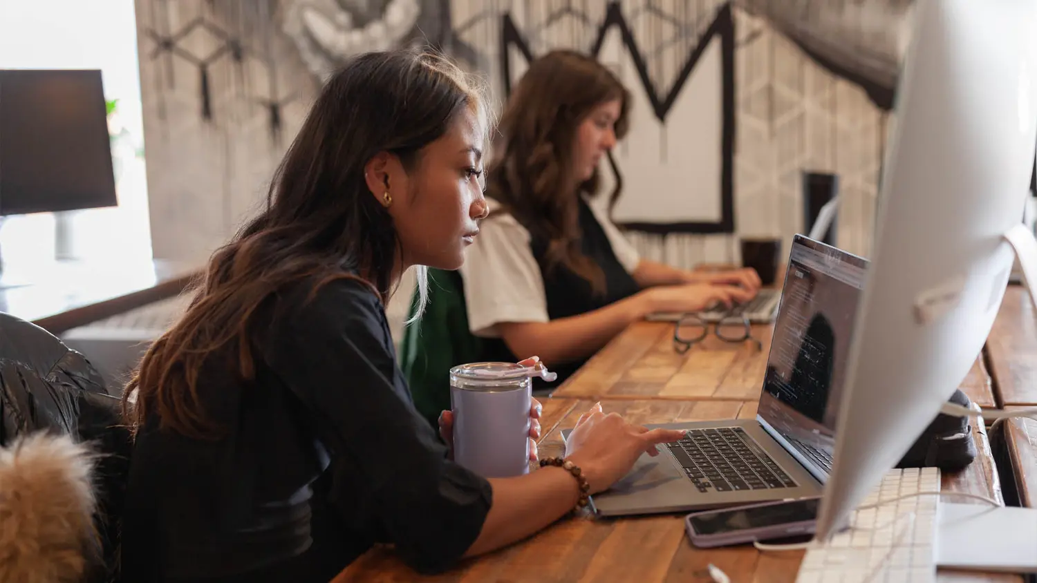 Creative flow in action—collaboration, focus, and a little caffeine magic.