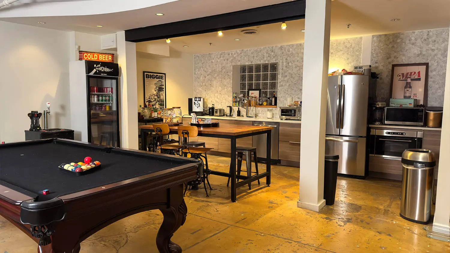 Fuel, fun, and connection. Our kitchen and pool table are where team spirit and ideas come to life.