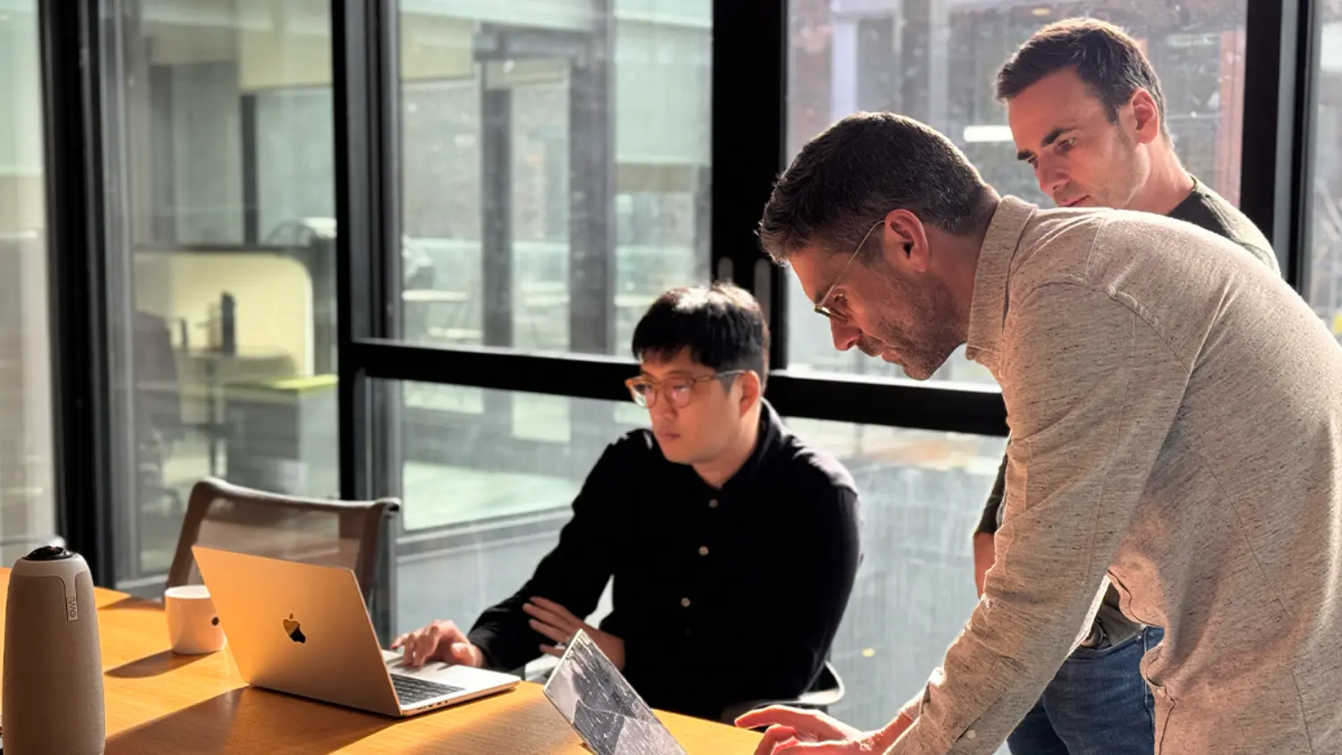 Collaborating on a project in our sunny Vancouver boardroom