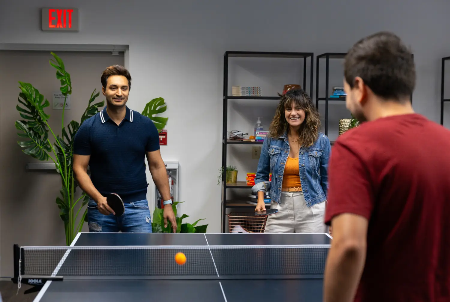 Thinkers playing ping pong at the Vancouver HQ Office!