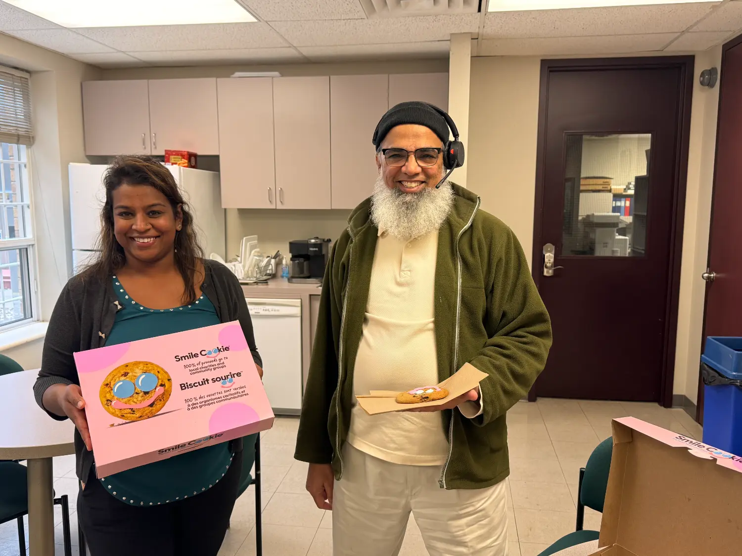 Staff celebrating the Smile Cookie campaign