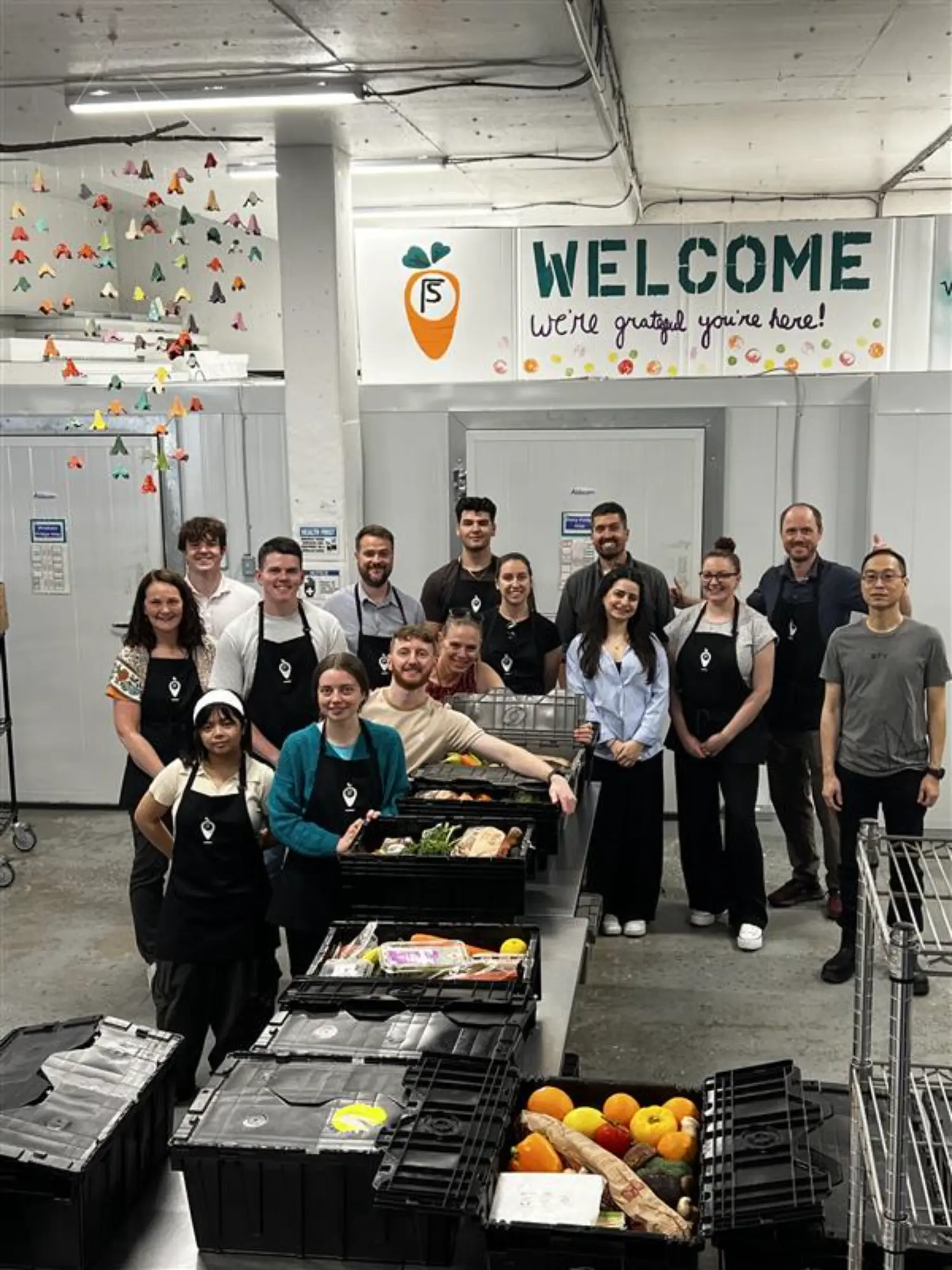 Vancouver volunteering with Food Stash, packaging up food for the community.
