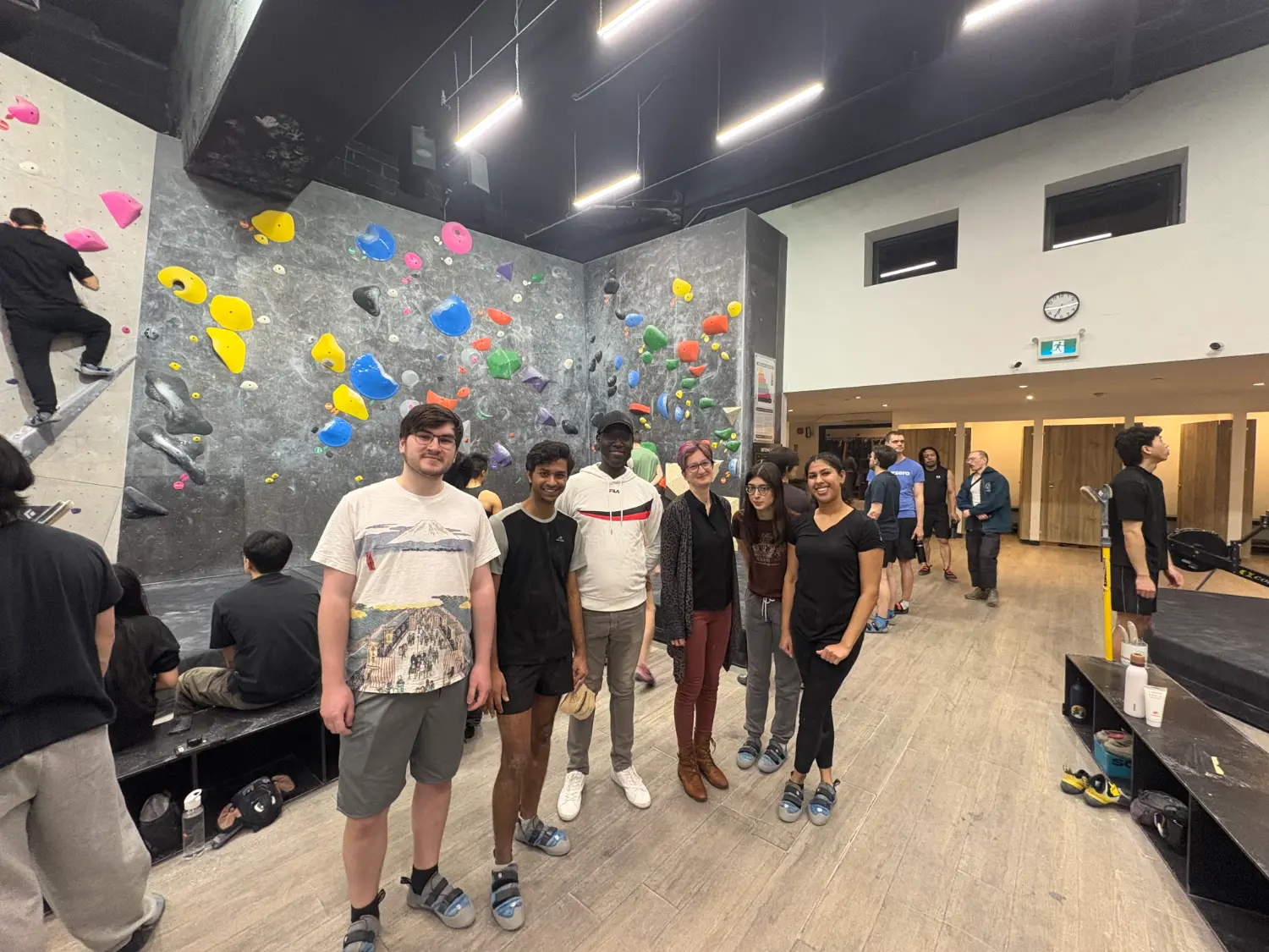 Toronto challenging themselves to rock wall climbing.