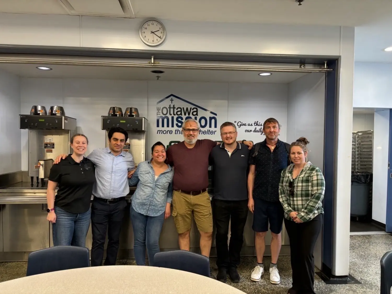 Ottawa volunteering with the Ottawa Mission, helping serve meals to the public.