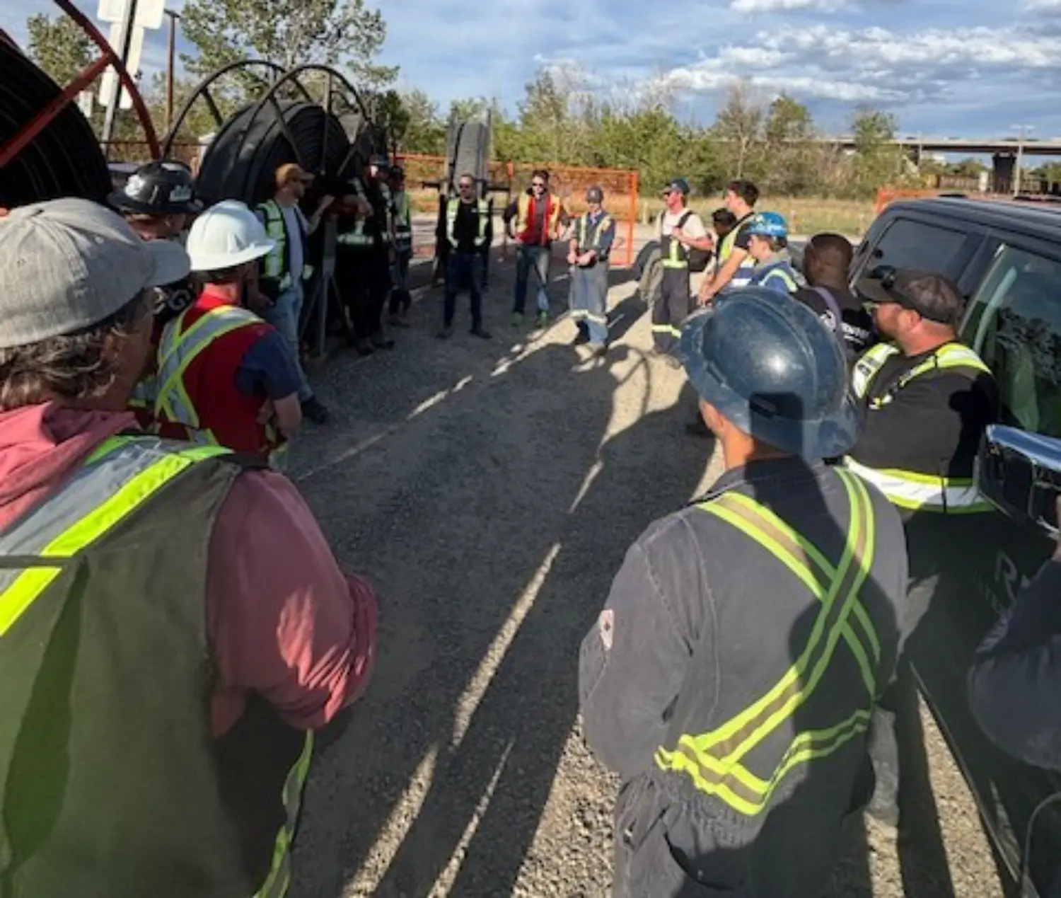 Shift huddle in action! Calgary emergency bypass work-teamwork powering rapid response.