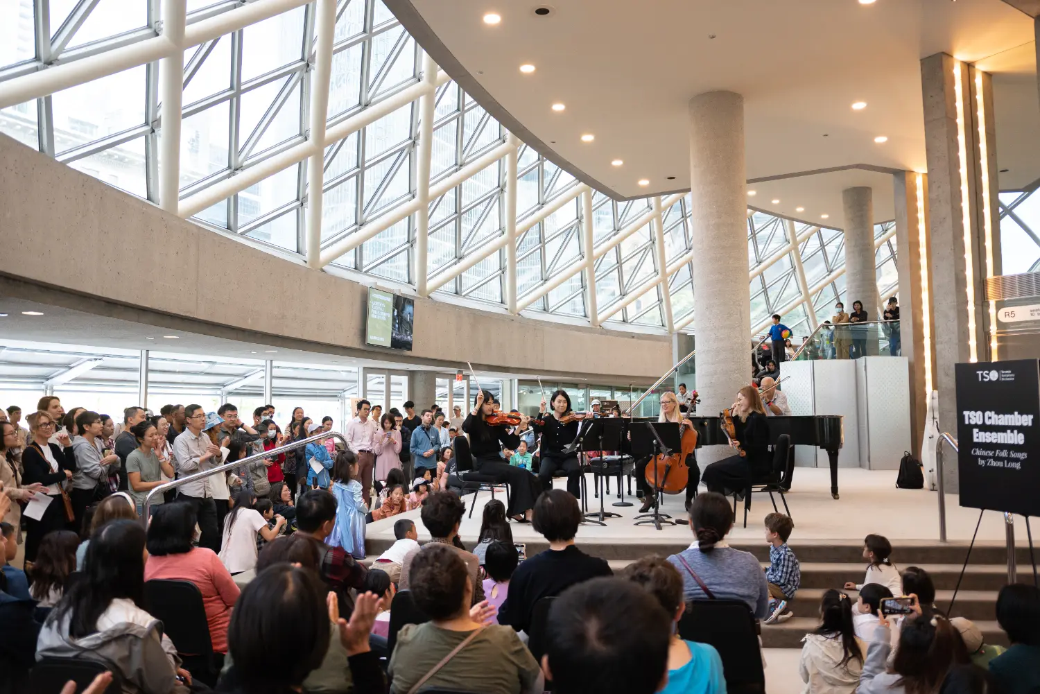 Toronto Symphony Orchestra members perform in the Roy Thomson Hall lobby at our Open House event.