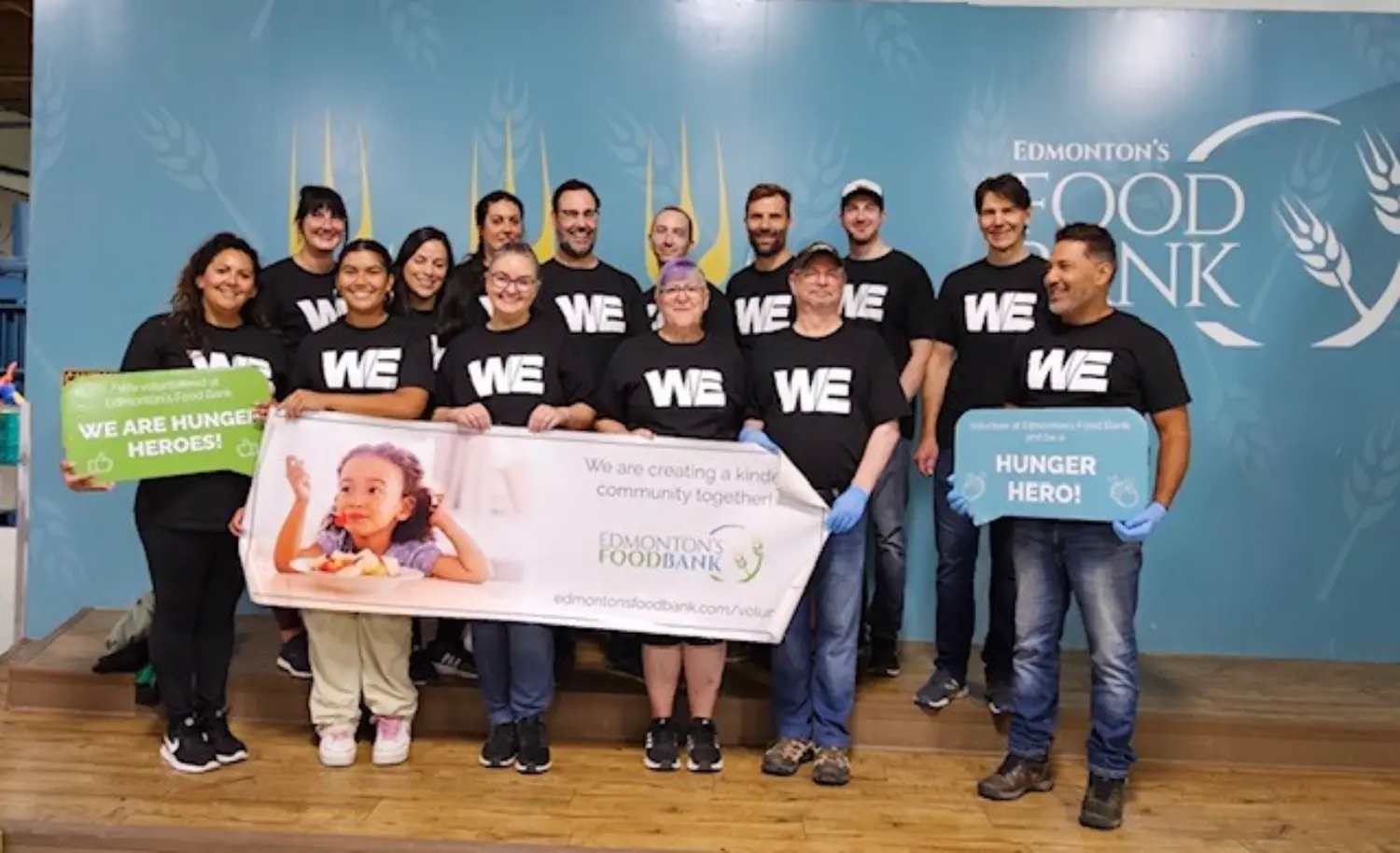 Our Edmonton team and some family members giving back by volunteering at the food bank.