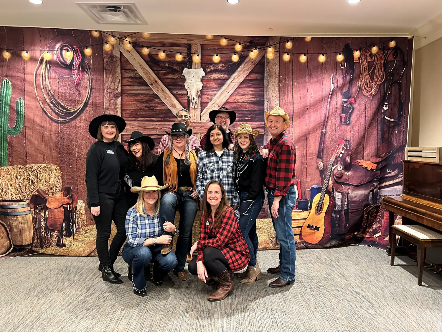 Directors team celebrating the holidays at a themed event