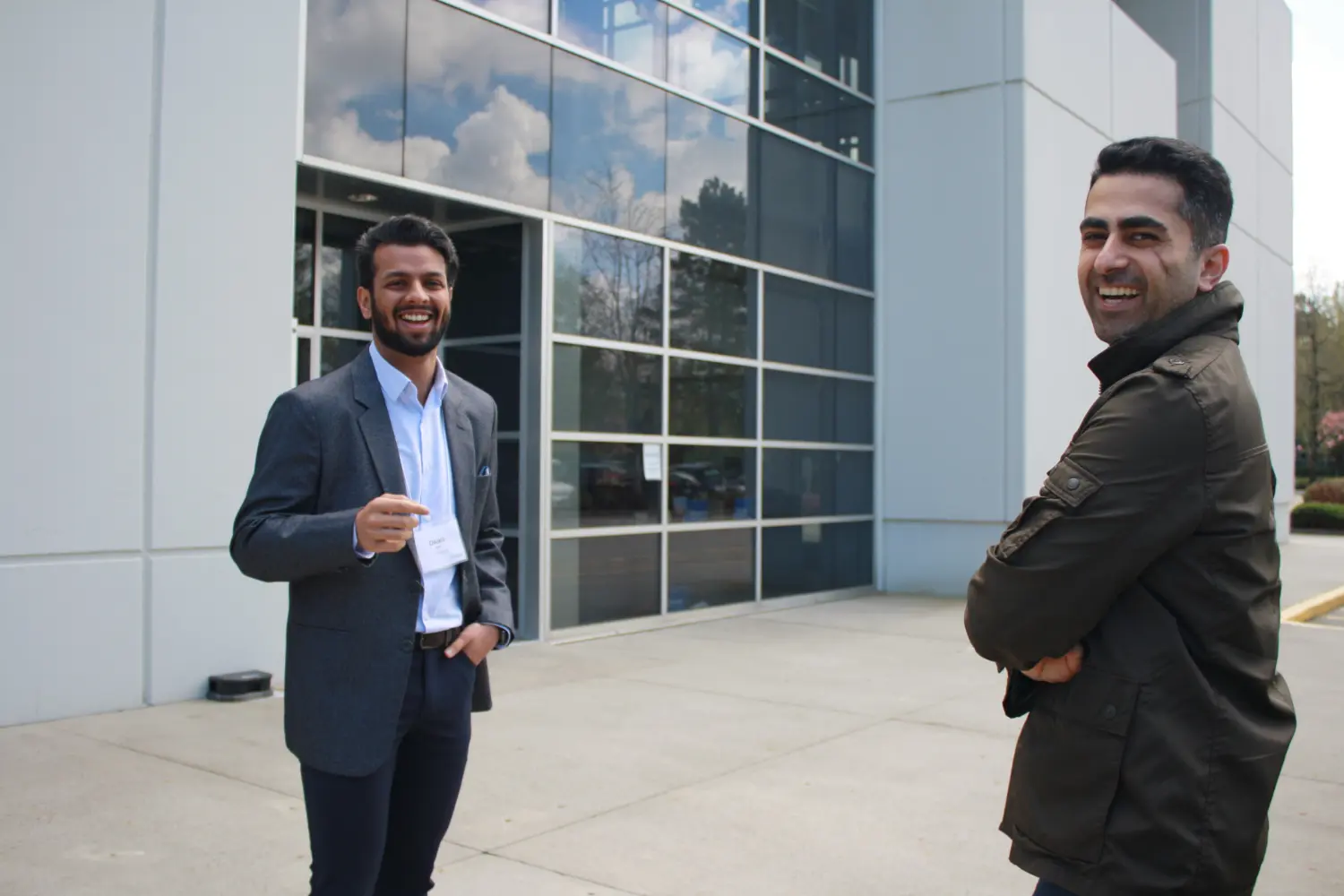 Employees meeting outside our HQ.