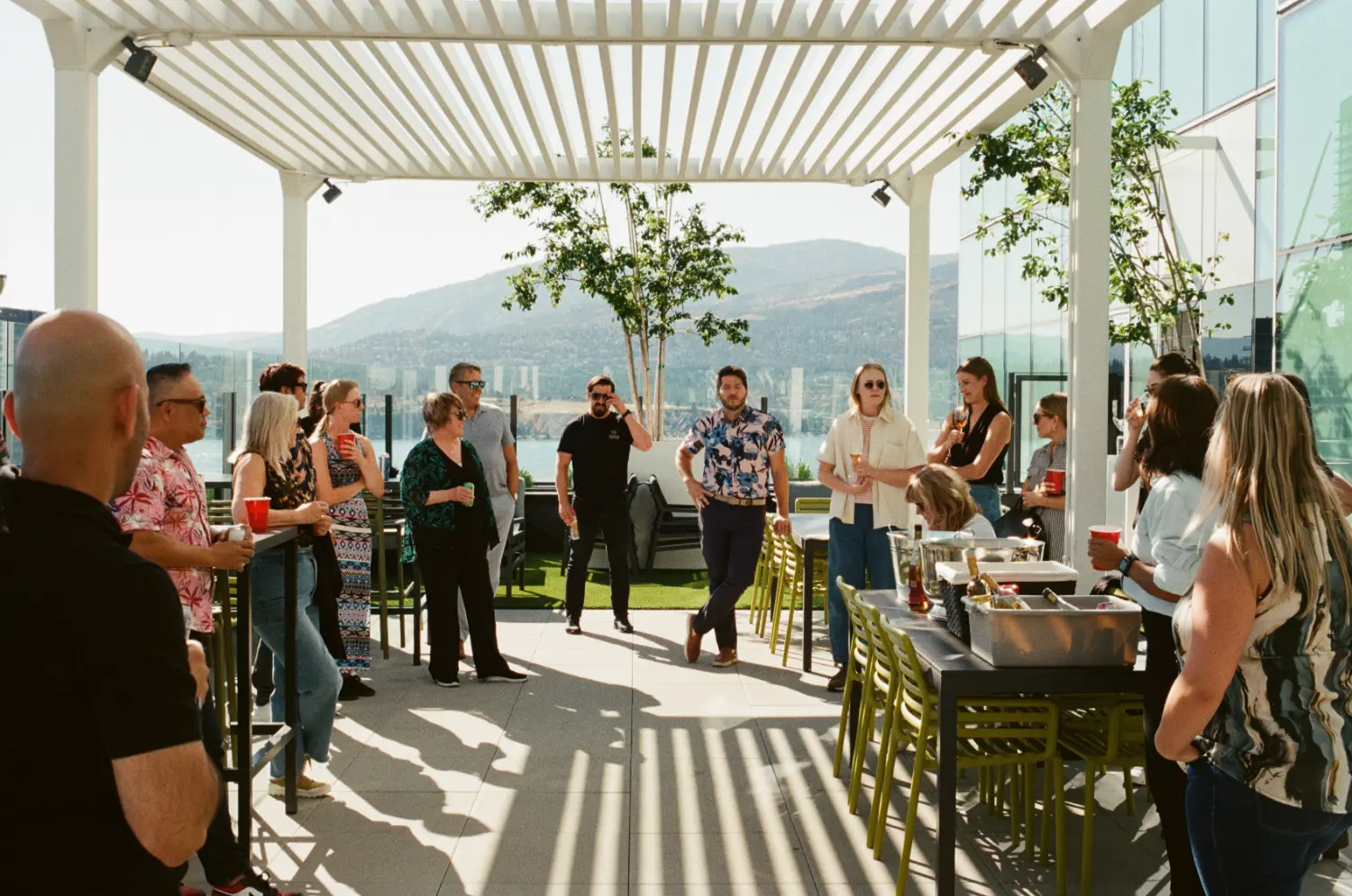 Office rooftop gatherings are used to celebrate team member accomplishments and to gather socially and connect.