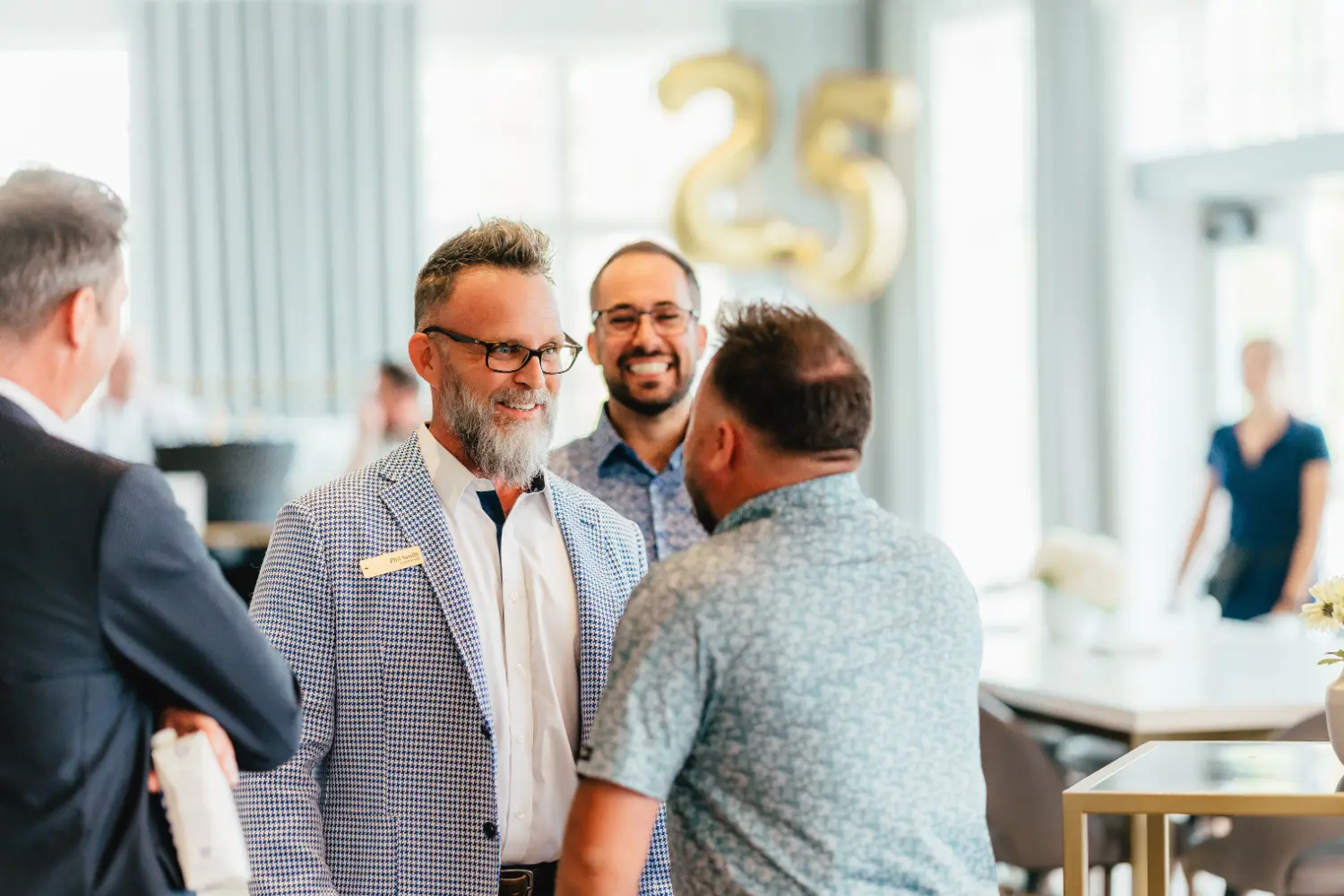 staff at 25th anniversary celebration