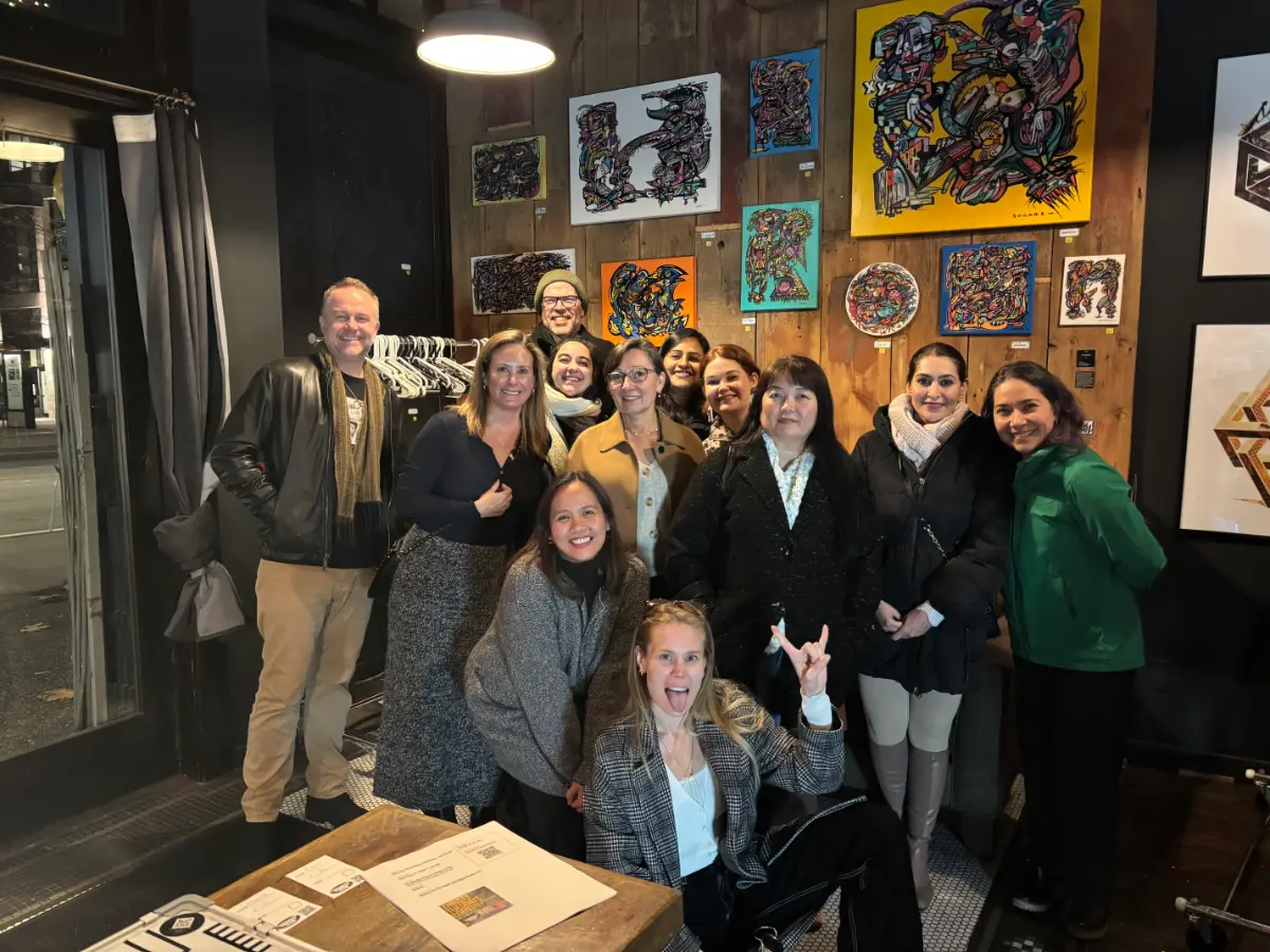 Lots of laughs at a comedy show during our winter social