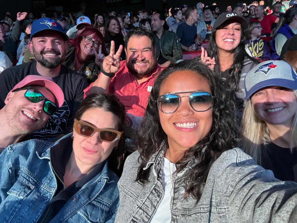 Members of our crew enjoying a baseball game together.