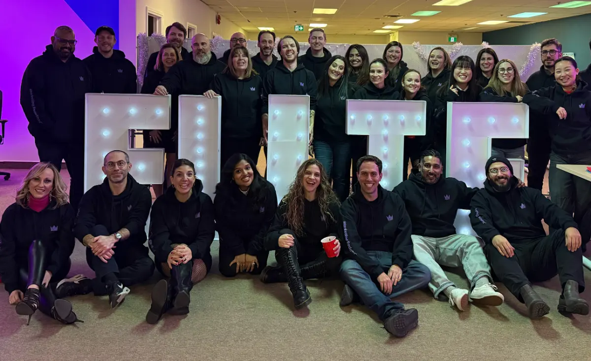 Elite Digital team holiday party with branded hoodies