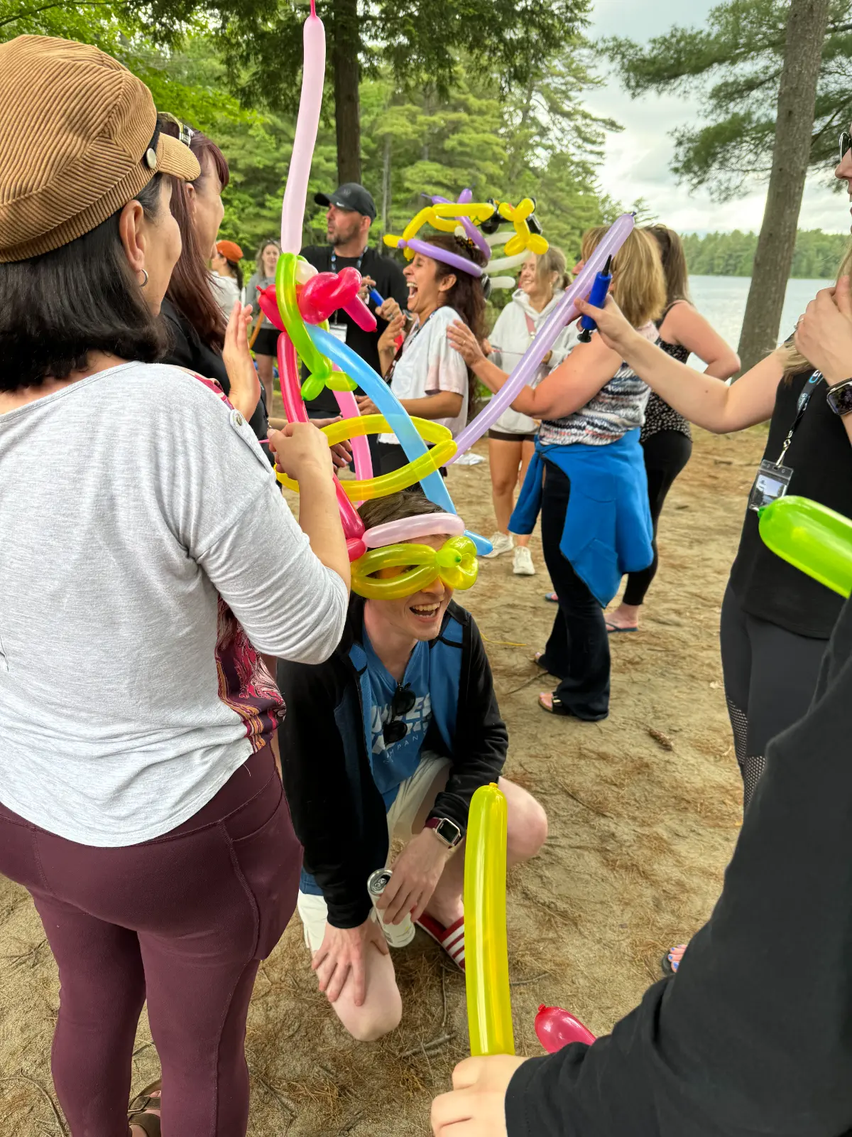Balloon hat team building activity during Gifford Carr's annual GC Connect event.