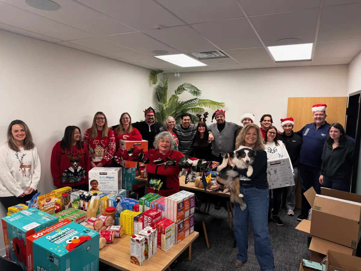 The team came together to donate over 10,000 items to local food banks over the holiday season.