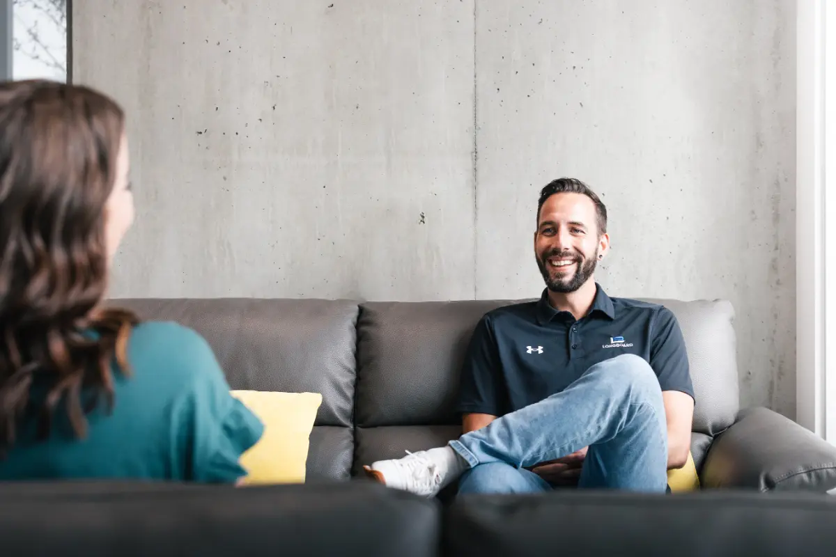Mark and Melody catch up in their one-on-one in the Longboard office.