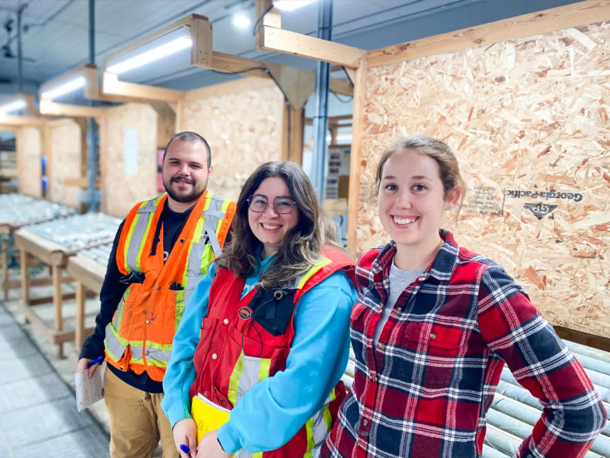 Our Geologists on a project site logging core at a core shack.