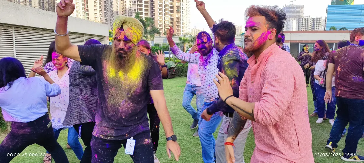 Our Noida team celebrating Holi, spreading colors, joy, and togetherness across the workplace.