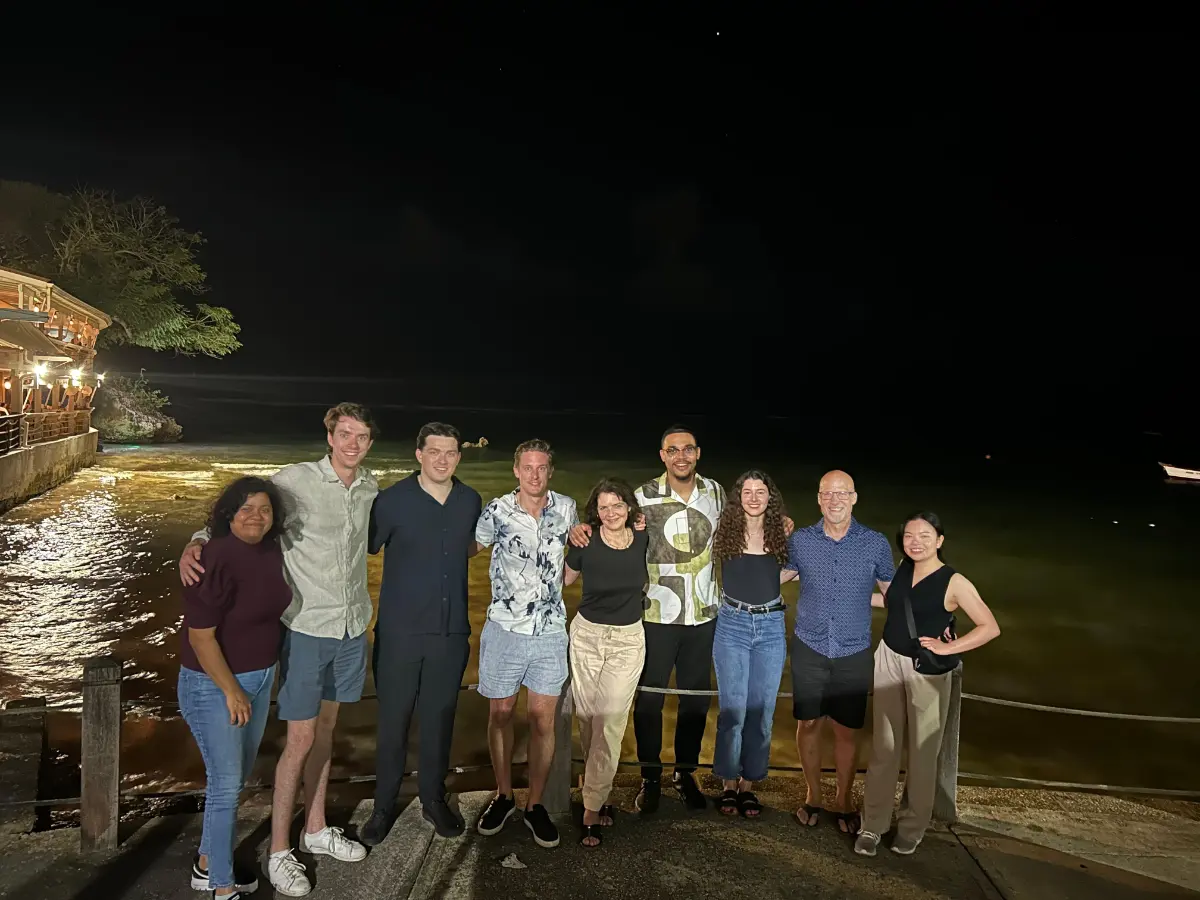 Ocean side dinner with colleagues who are working on multiple projects with different clients while on the same island