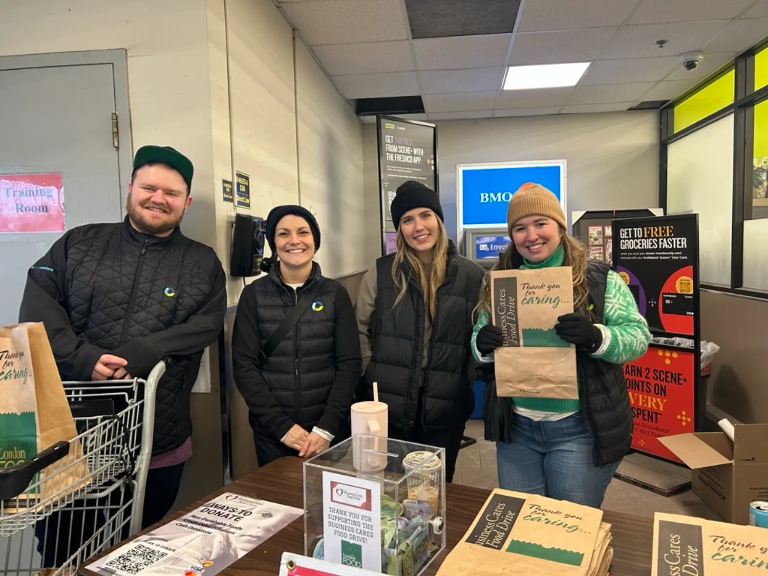 Team members volunteering for the London Food Bank.