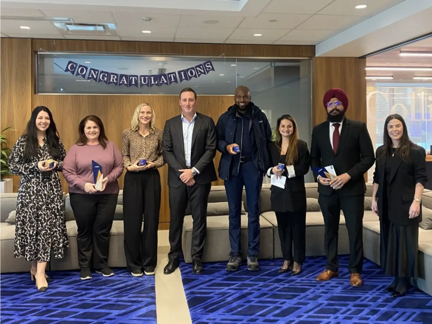 Spirit of Colliers Awards winners at our awards ceremony in our Toronto office