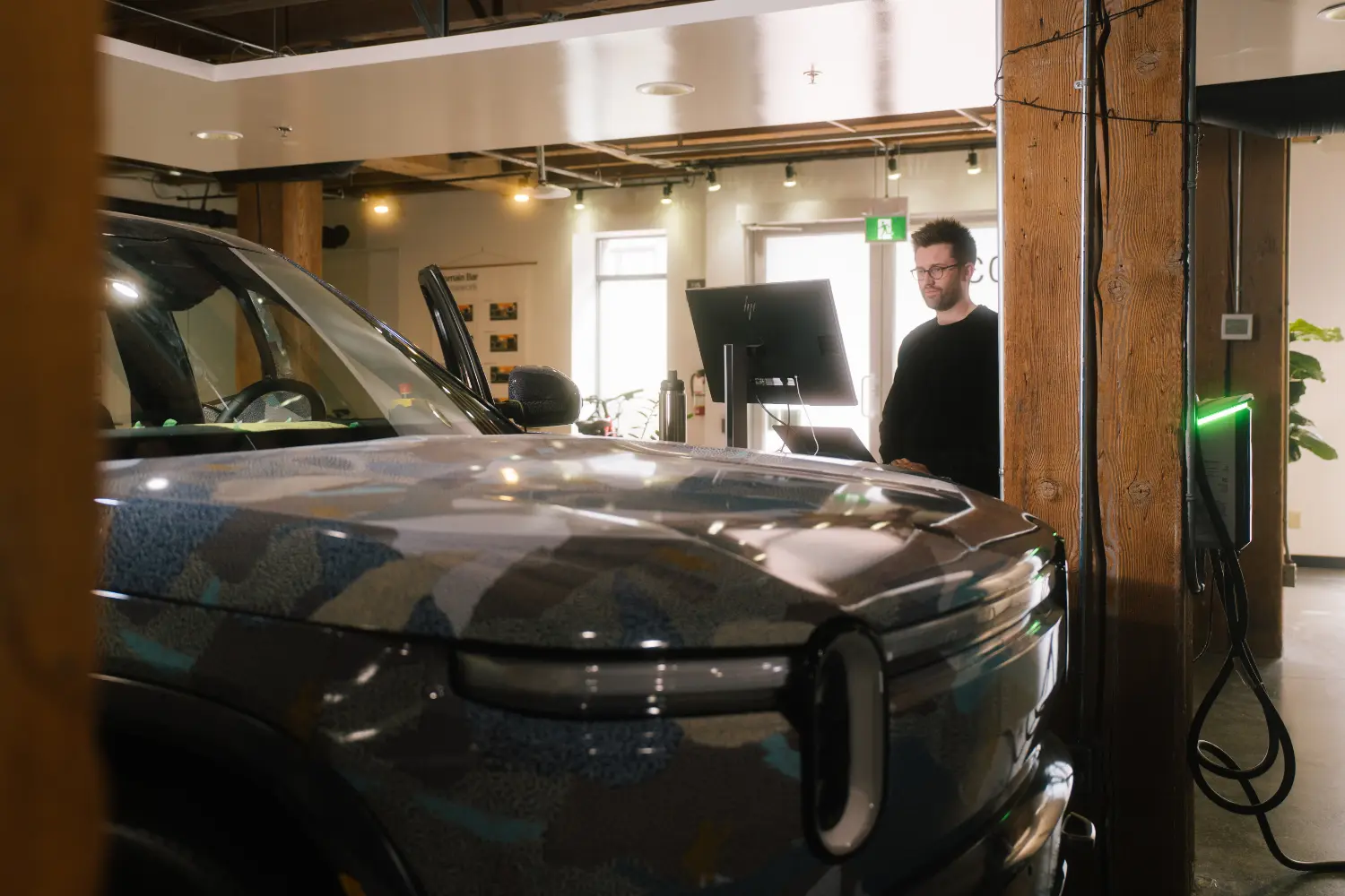 Where cutting-edge software meets the road. Building electric vehicle technology that pushes both companies forward.