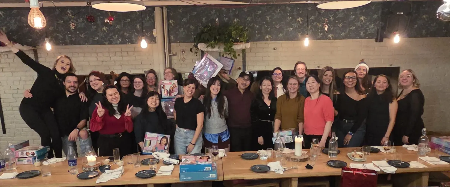 Sharing smiles, laughter, and good food! Holiday lunch with our Quebec team