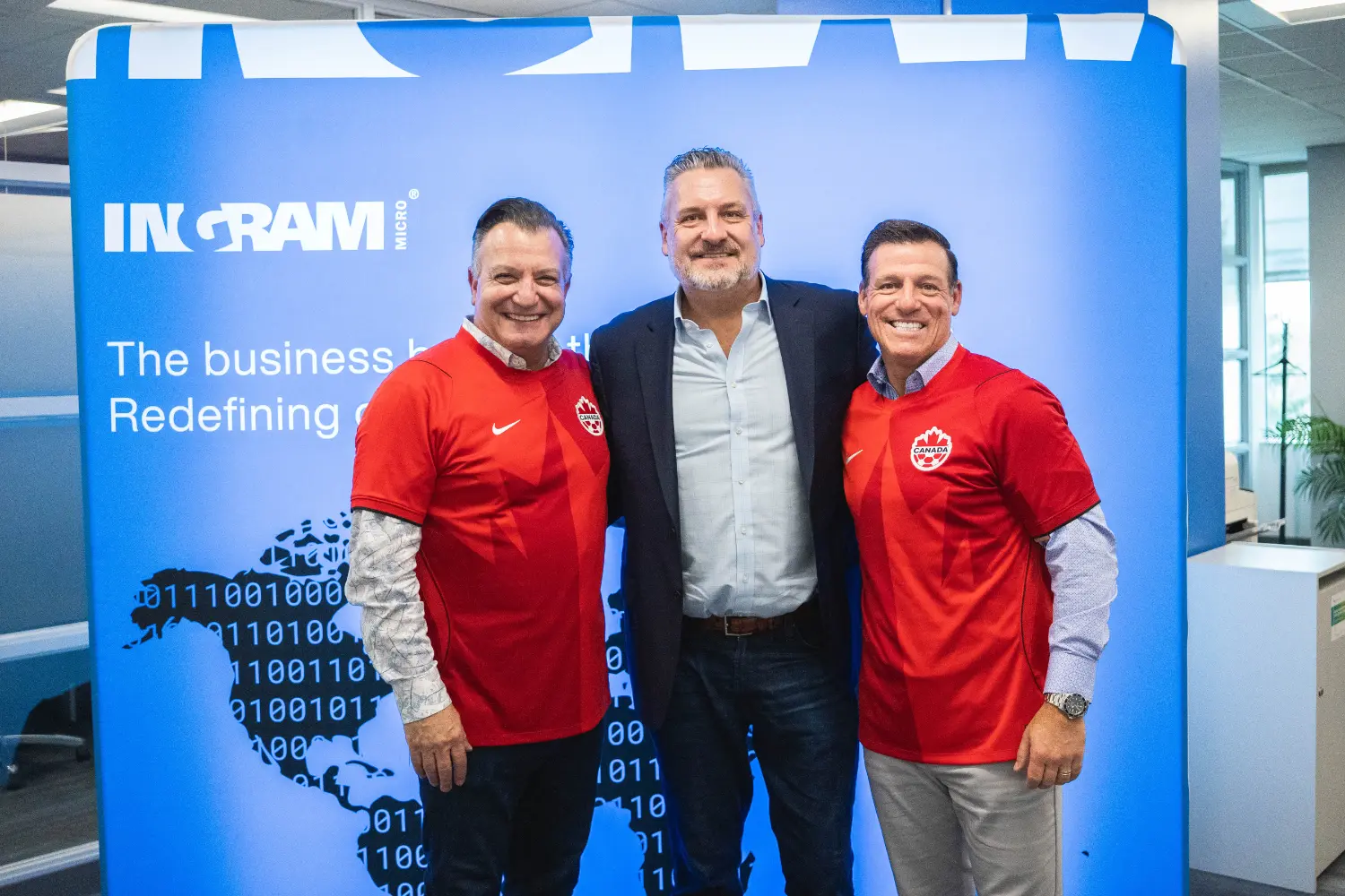 Paul Bay (Global CEO), Bill Brandel (EVP, Global Group President, NA), and Tyler Coughlan (Canadian Chief Executive)